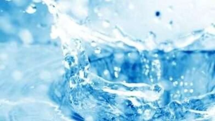 Blue water splash. Clear and pure.